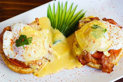 three mermaids brunch menu eggs benedict dish